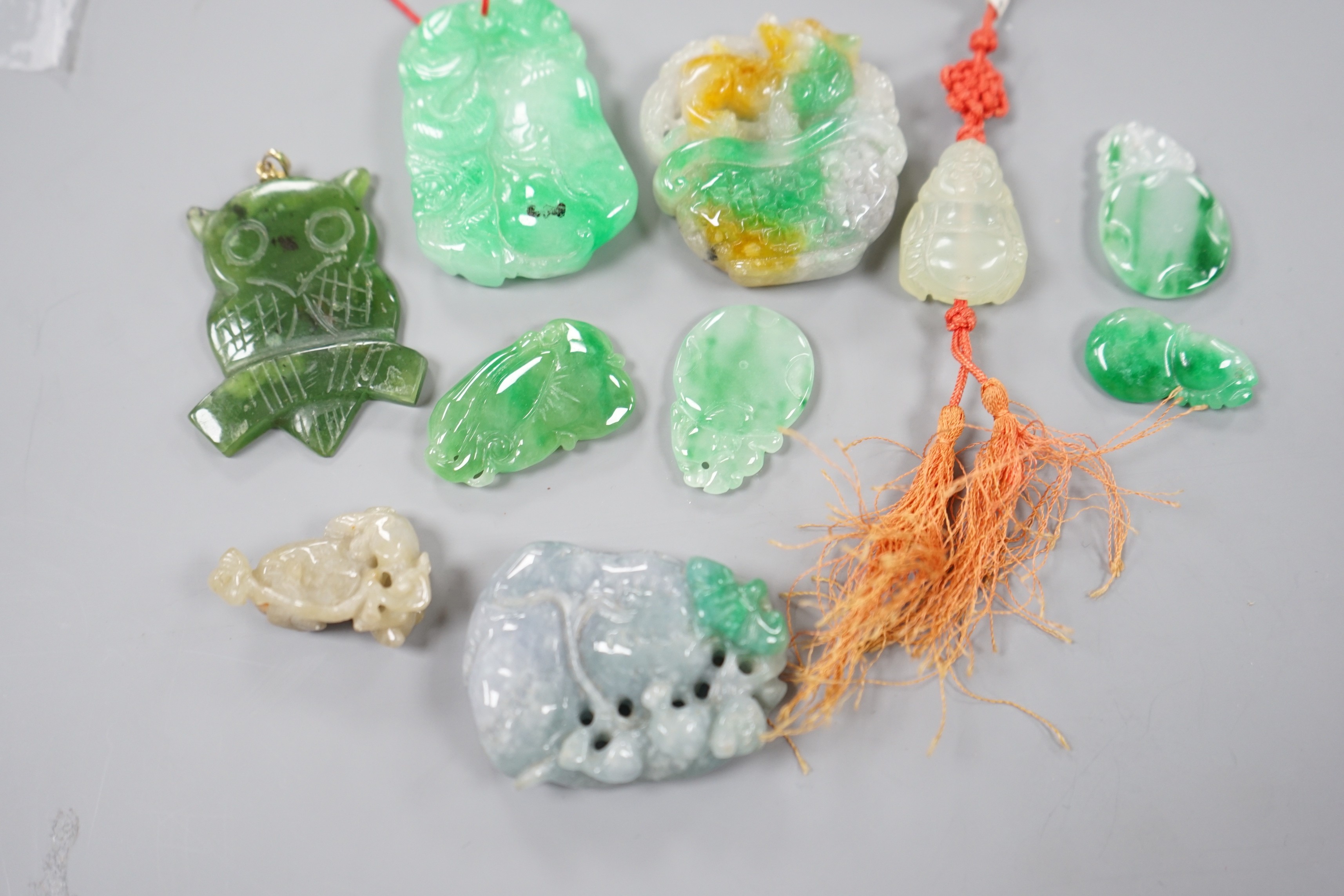 A group of ten jadeite and hardstone carvings and pendants